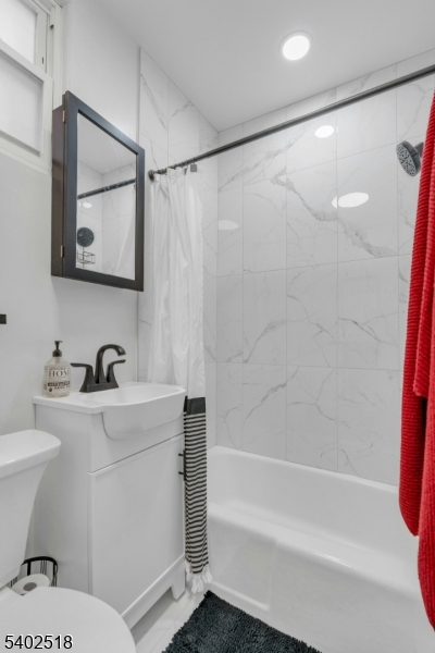 68 Pine Street Montclair, NJ 07042 - Photo 18 of 23 a bathroom with a sink toilet and shower