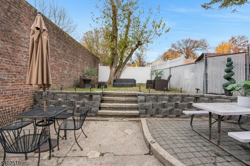 68 Pine Street Montclair, NJ 07042 - Photo 20 of 23 a view of backyard with sitting area