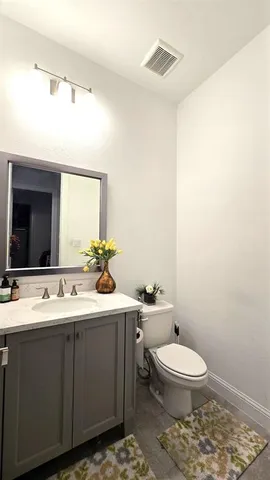 a bathroom with a sink and a toilet