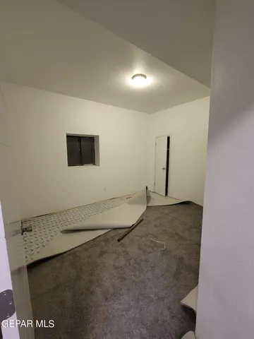 a view of a room that has a window in it