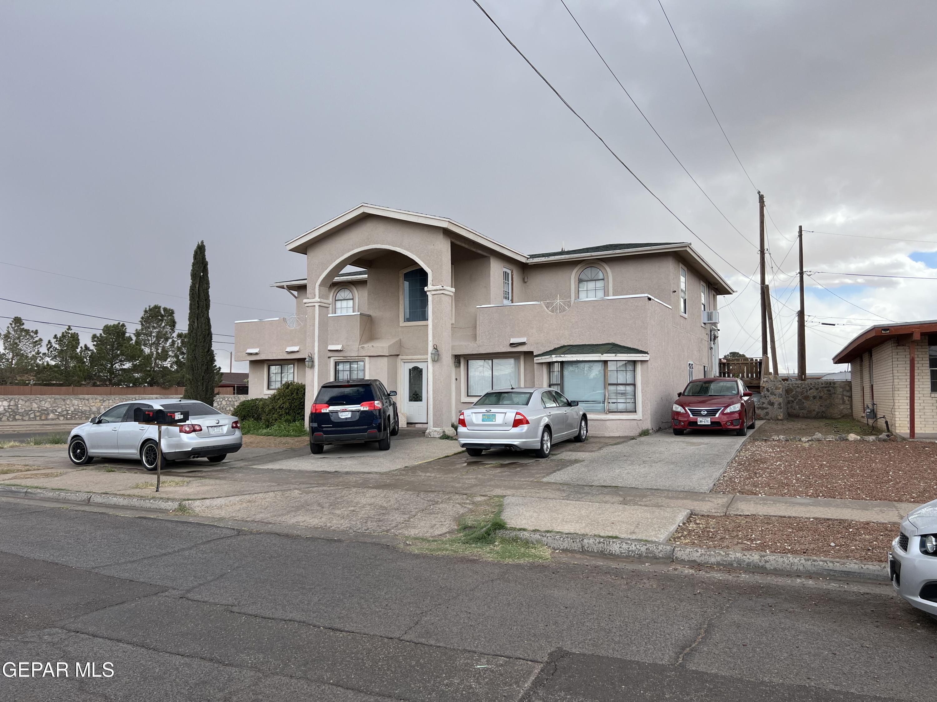 324 Valley Fair Way El Paso, TX 79907 - Photo 2 of 82 a view of a cars parked in front of a house