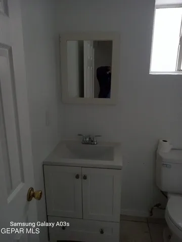 a bathroom with a toilet a sink and a bathtub