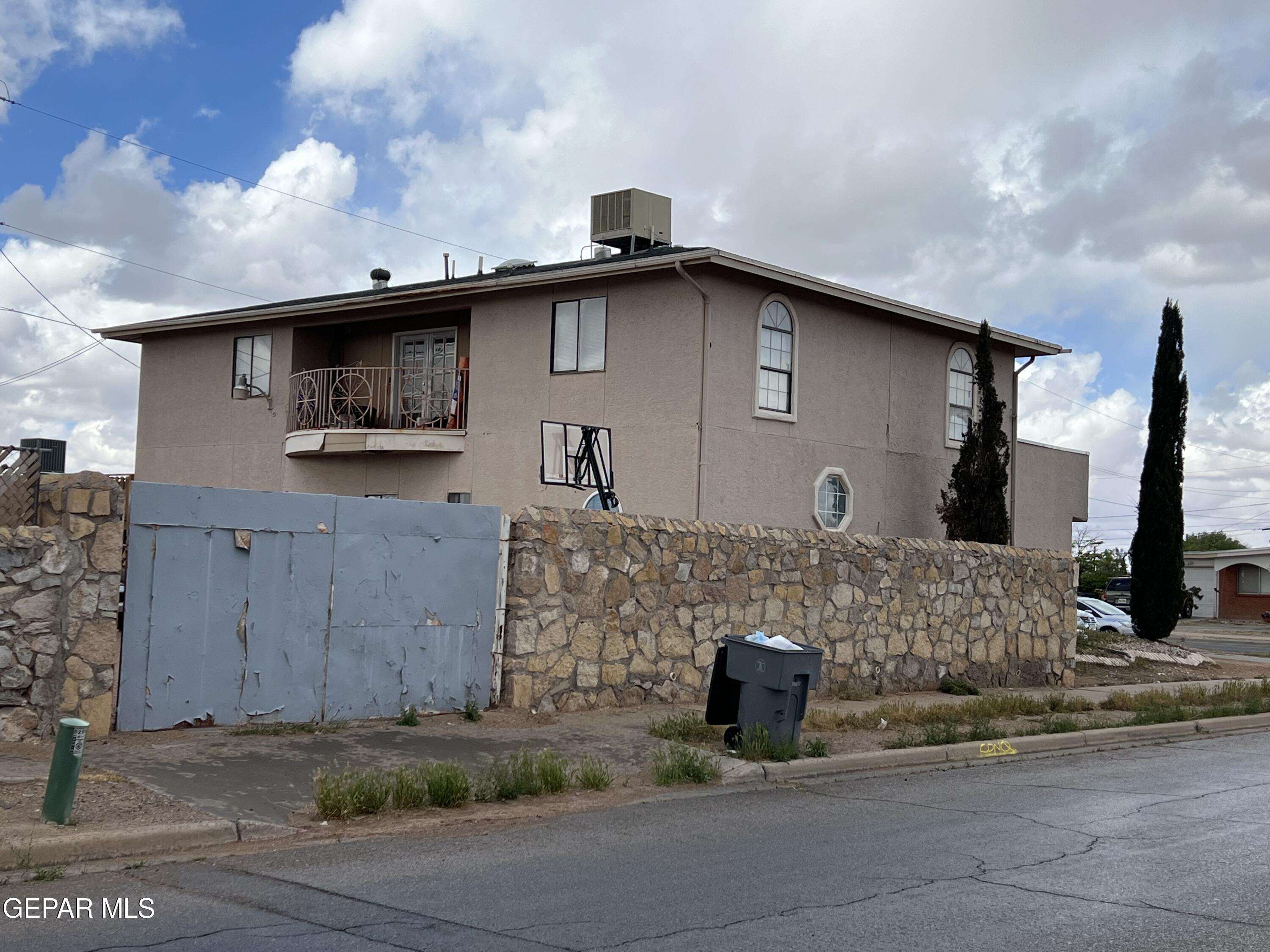 324 Valley Fair Way El Paso, TX 79907 - Photo 3 of 82 a front view of a house with garage