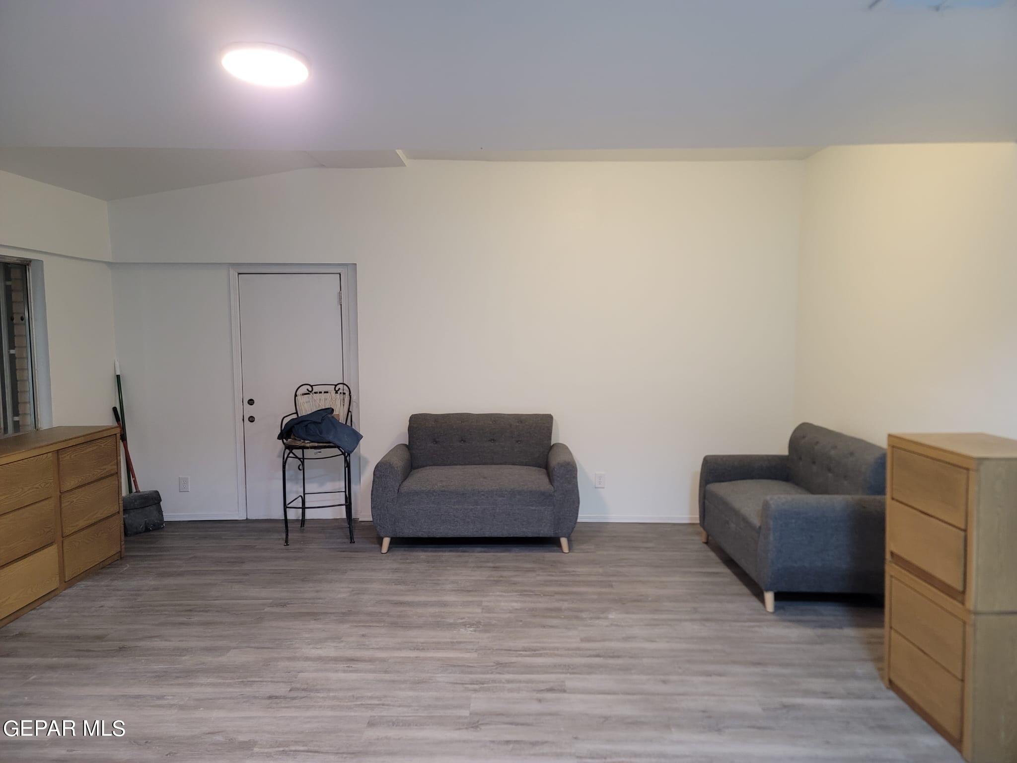 324 Valley Fair Way El Paso, TX 79907 - Photo 7 of 82 a living room with furniture and a couch