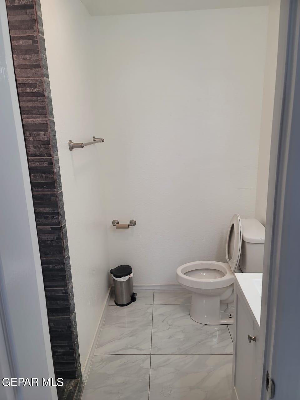 324 Valley Fair Way El Paso, TX 79907 - Photo 75 of 82 a bathroom with a toilet and a shower