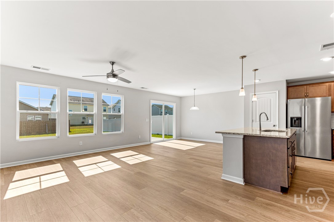 221 Hasty Point Road Rincon, GA 31326 - Photo 4 of 40 Great Room and Kitchen