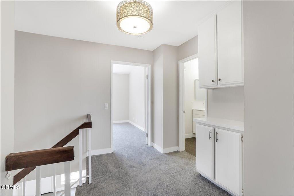 5147 Perkins Road Oxnard, CA 93033 - Photo 20 of 42 a view of an empty room with wooden floor