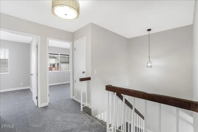 a view of hallway with stairs