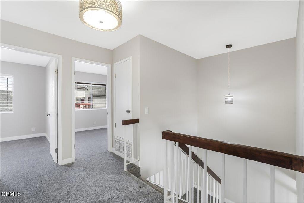 5147 Perkins Road Oxnard, CA 93033 - Photo 21 of 42 a view of hallway with stairs
