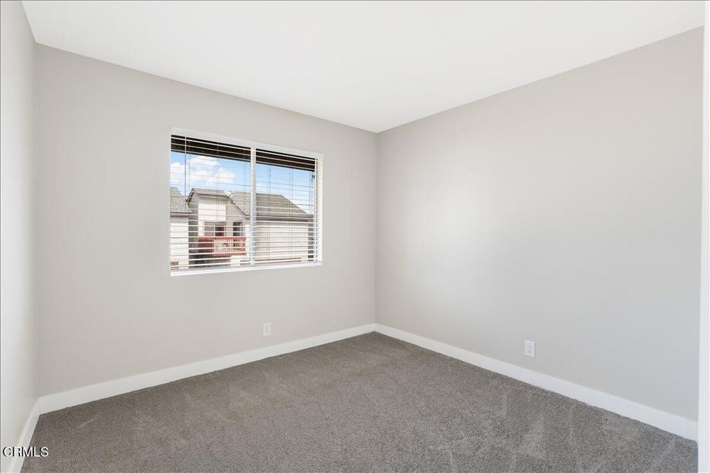 5147 Perkins Road Oxnard, CA 93033 - Photo 26 of 42 an empty room with a window