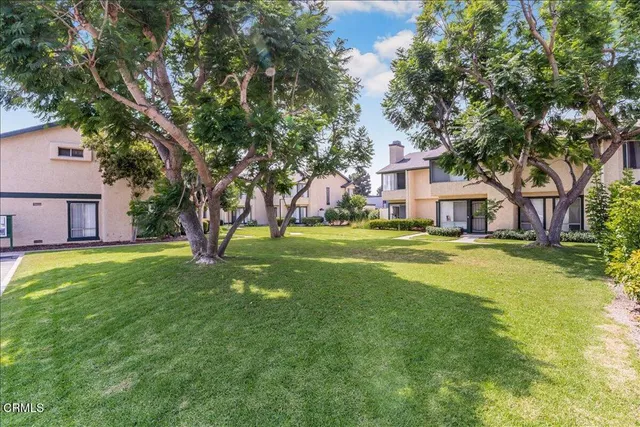 a house view with a garden space