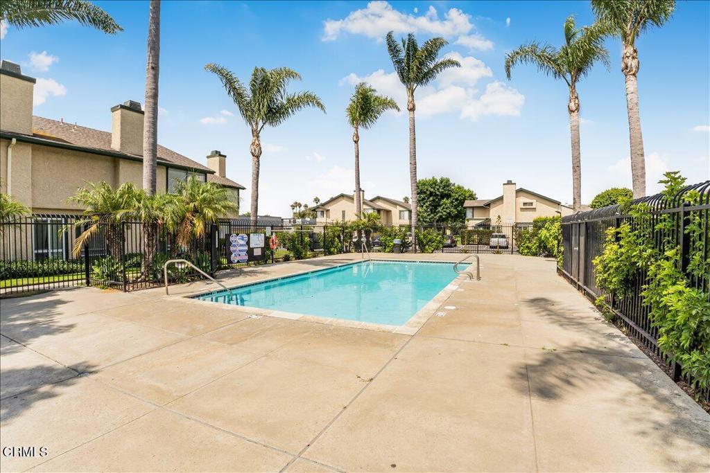 5147 Perkins Road Oxnard, CA 93033 - Photo 42 of 42 a view of a swimming pool with a garden