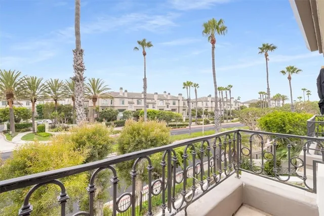 a view of swimming pool from a balcony