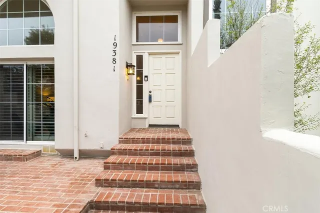 a front view of a house with windows
