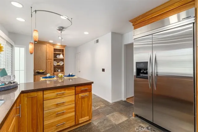 a bathroom with a sink a mirror and a shower