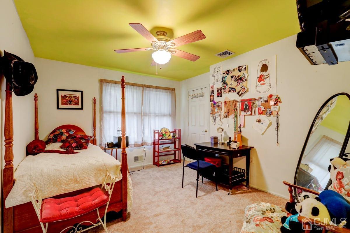 19 North Rhoda Street Monroe Township, NJ 08831 - Photo 17 of 26 a living room with furniture and a large window