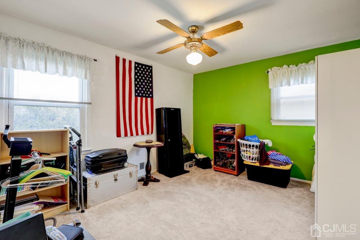 19 North Rhoda Street Monroe Township, NJ 08831 - Photo 20 of 26 a bedroom with furniture and a window