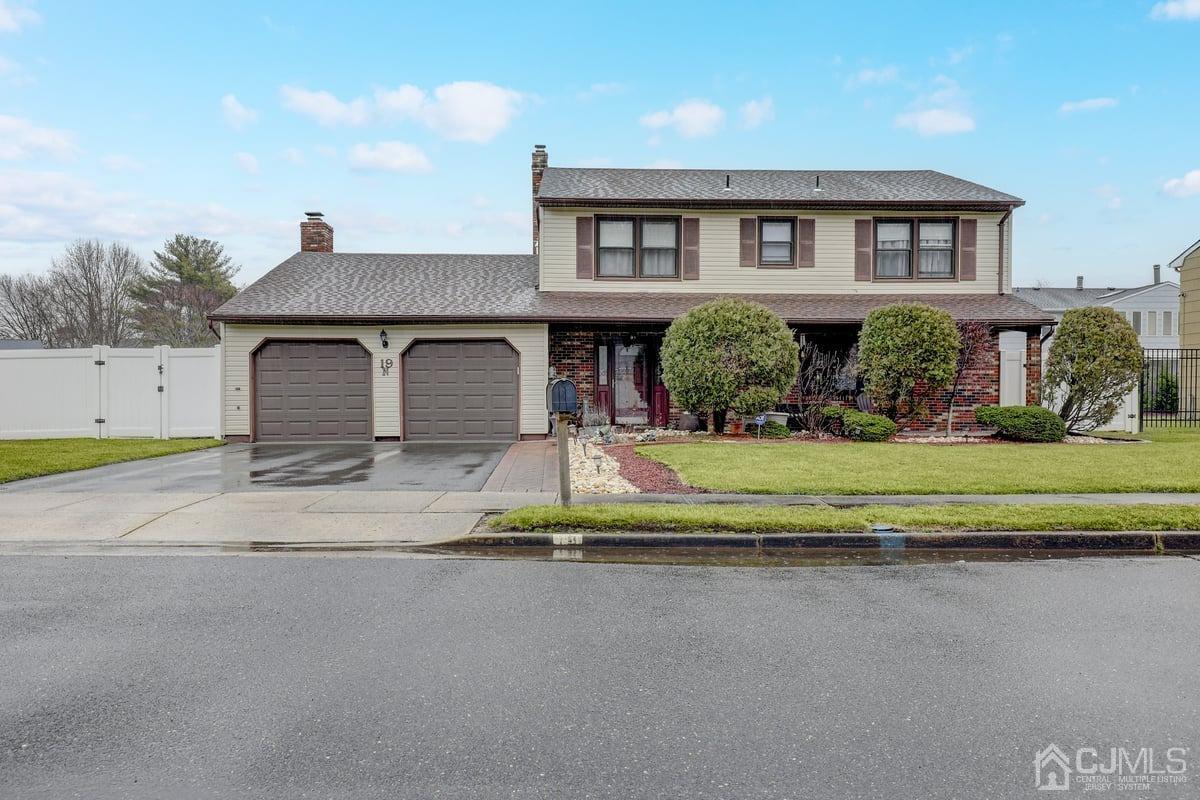 19 North Rhoda Street Monroe Township, NJ 08831 - Photo 2 of 26 a house view with a garden space