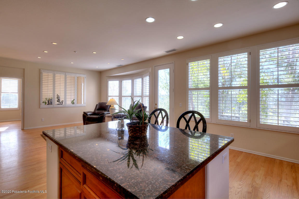 7461 Chanteclair Court Tujunga, CA 91042 - Photo 11 of 44 a view of a kitchen and dining room with window