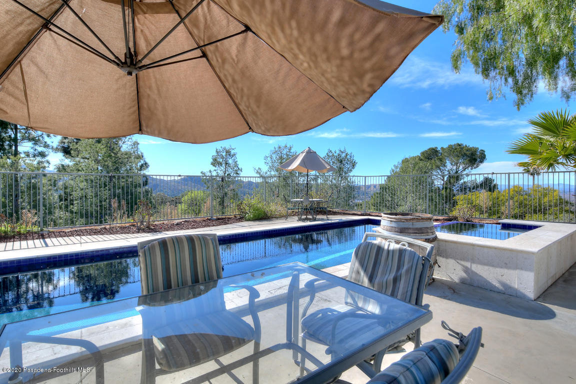 7461 Chanteclair Court Tujunga, CA 91042 - Photo 32 of 44 a view of a chairs and table in the patio
