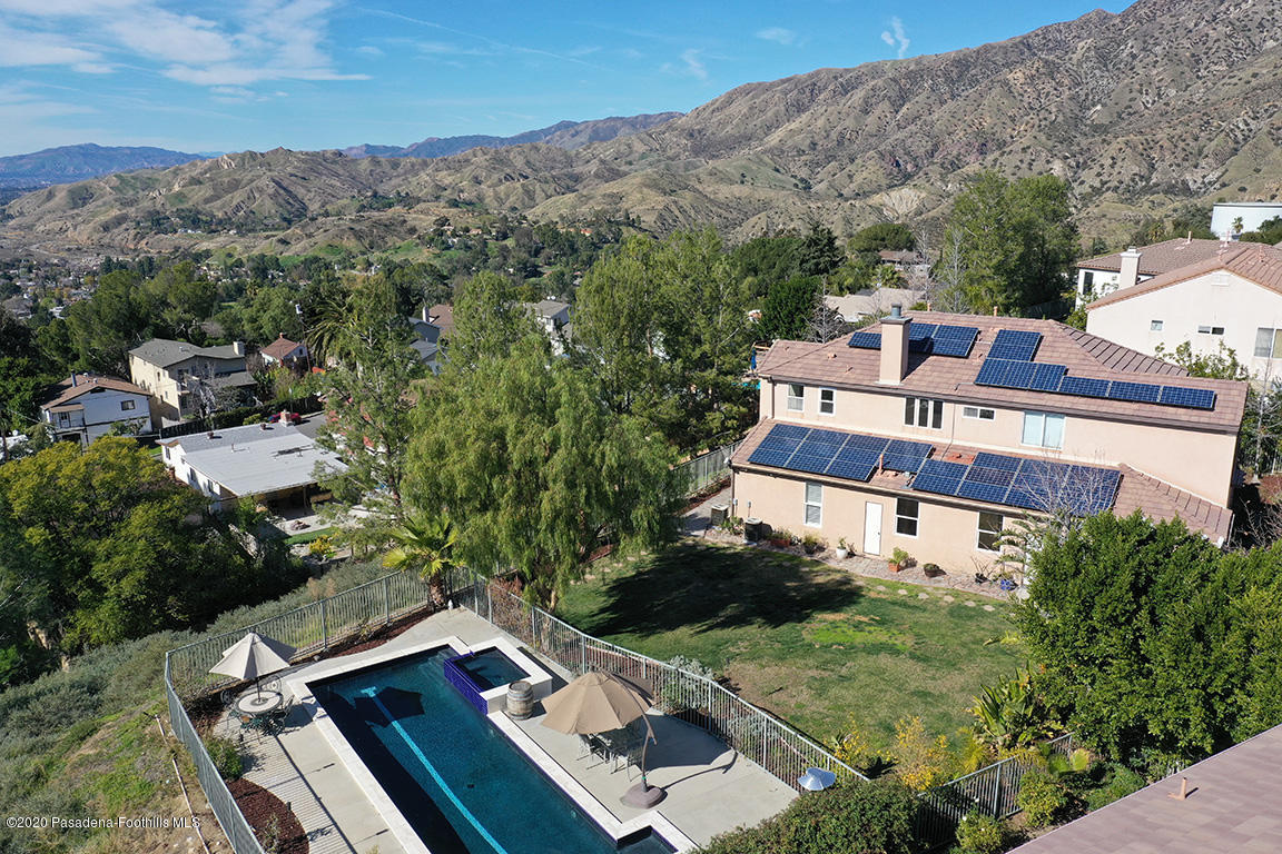 7461 Chanteclair Court Tujunga, CA 91042 - Photo 38 of 44 an aerial view of a house with a mountain