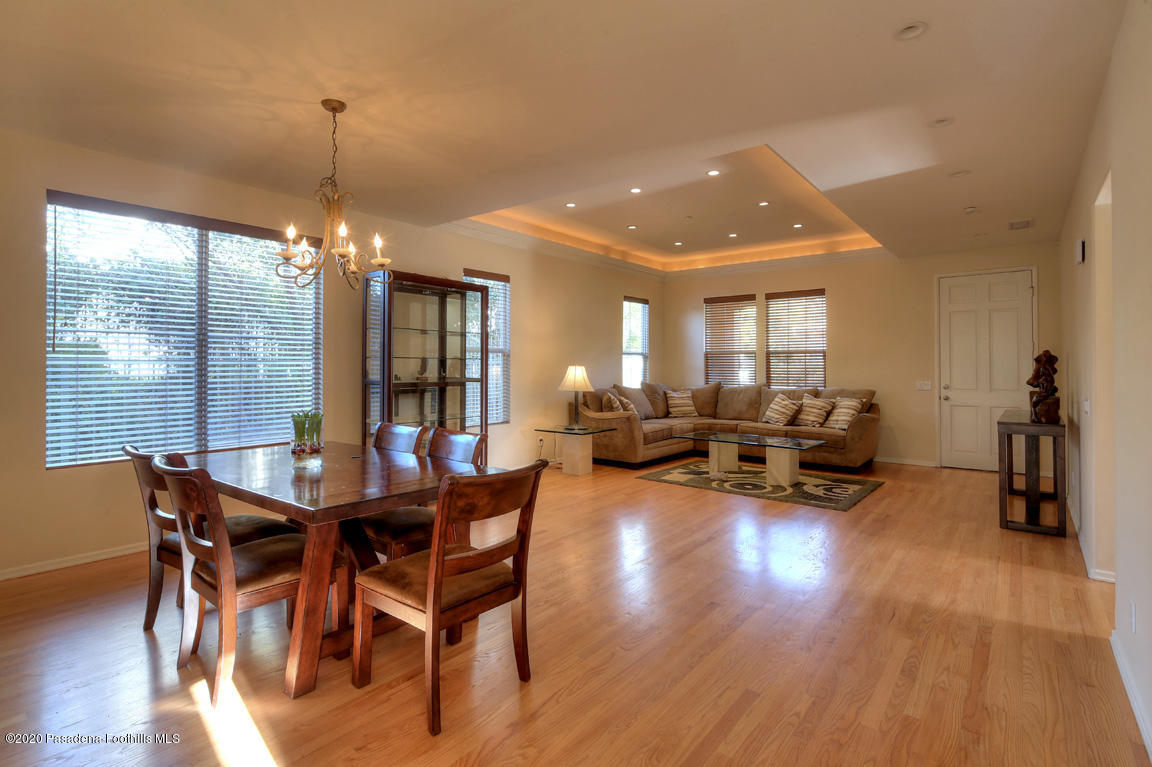 7461 Chanteclair Court Tujunga, CA 91042 - Photo 6 of 44 a view of a dining room with furniture and wooden floor