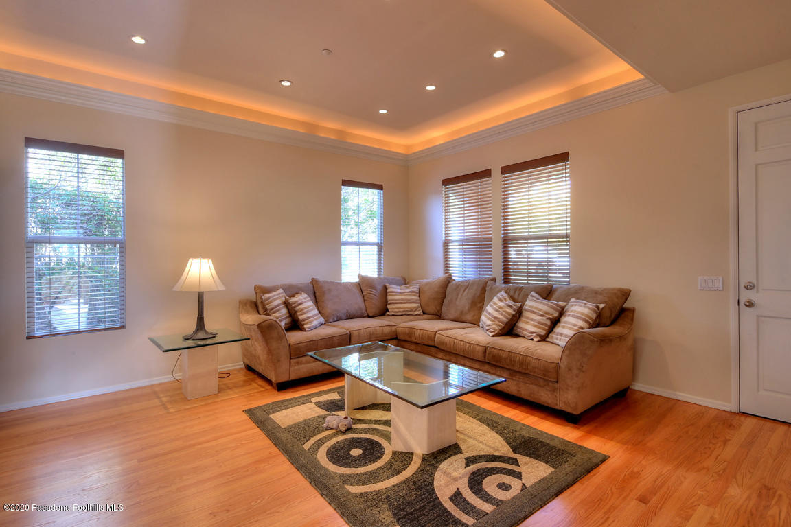 7461 Chanteclair Court Tujunga, CA 91042 - Photo 7 of 44 a living room with furniture and a lamp