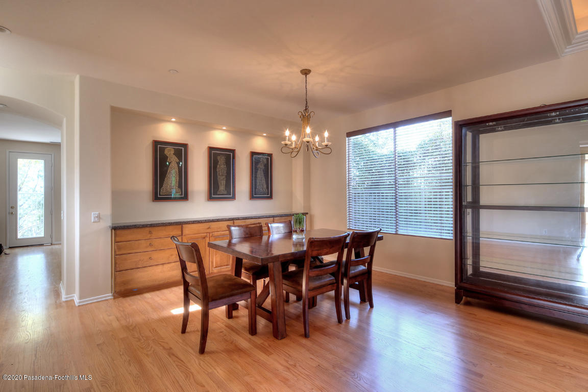 7461 Chanteclair Court Tujunga, CA 91042 - Photo 8 of 44 a view of a dining room with furniture window and wooden floor