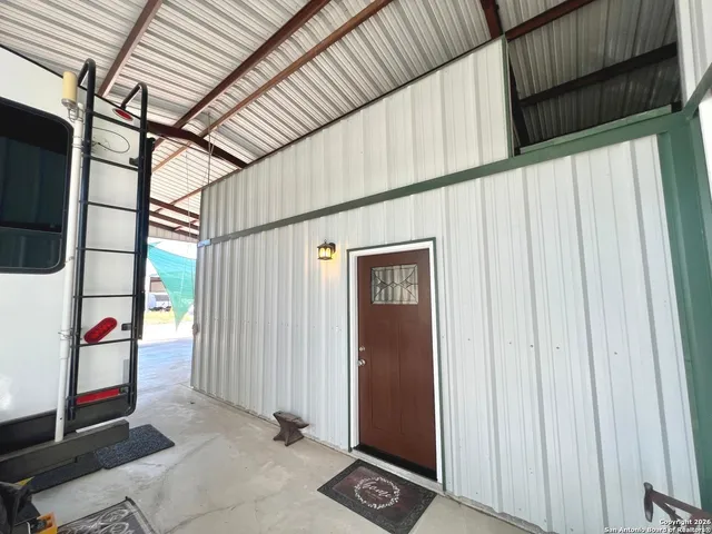 a view of a hall with front door