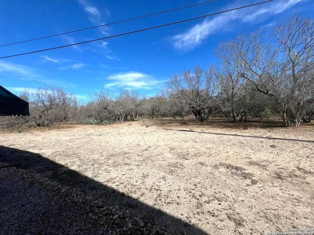 a bed room with two beds and a couch