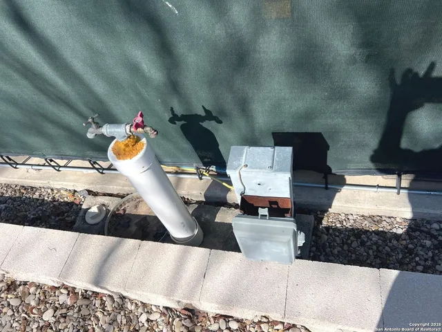 a living room with chairs