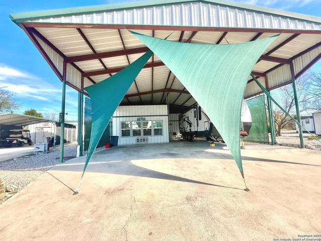 a view of a house with a park