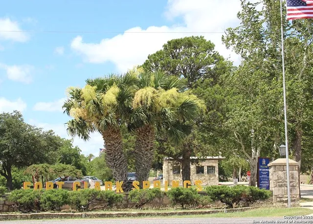 a outdoor space with lots of tables and chairs