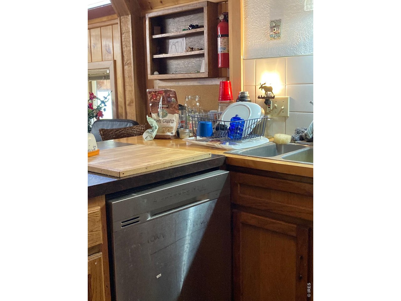 1064 Cold Springs Road Nederland, CO 80466 - Photo 23 of 48 a kitchen with a sink and a window