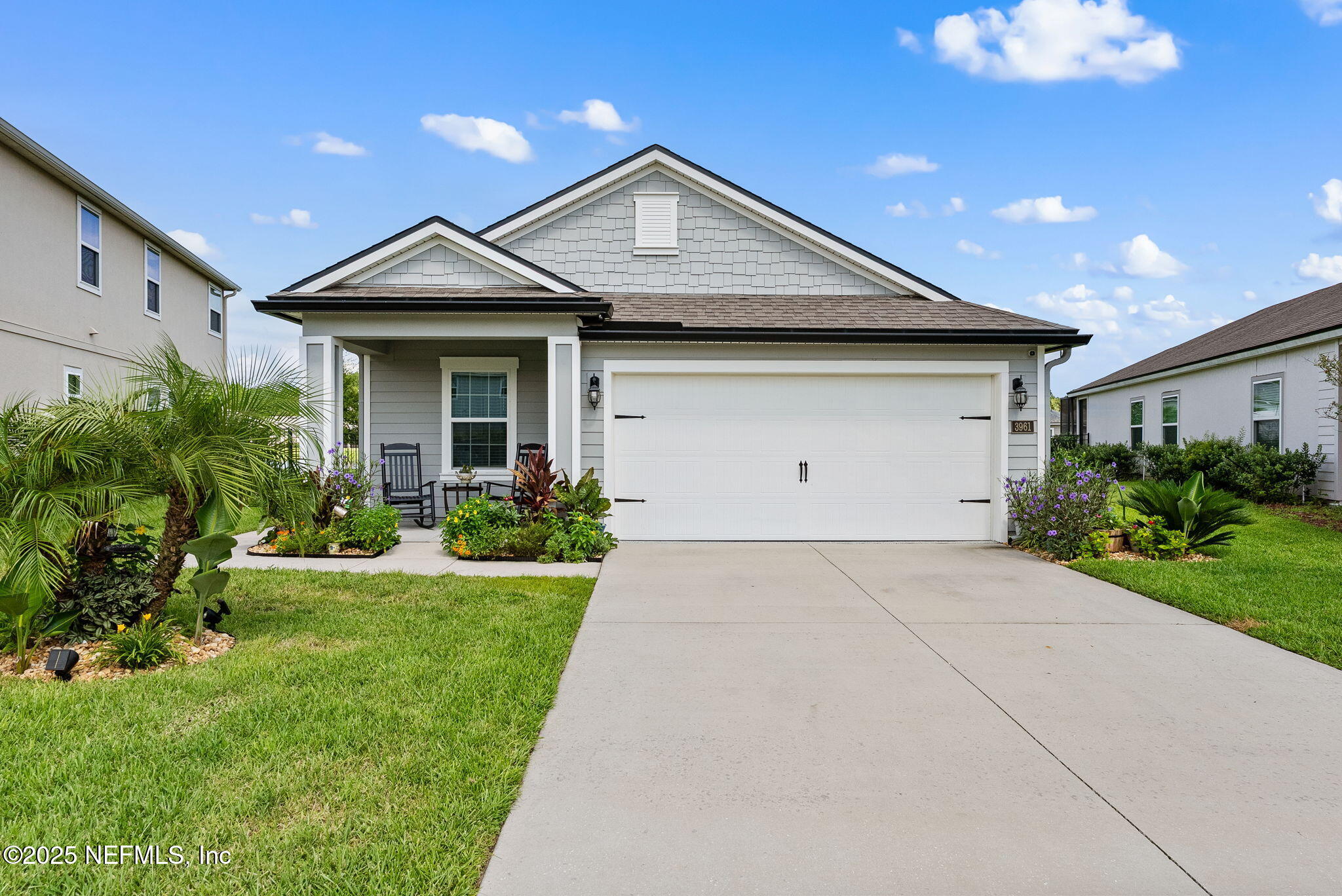 3961 Heatherbrook Place Middleburg, FL 32068 - Photo 1 of 28 a front view of a house with a yard and garage