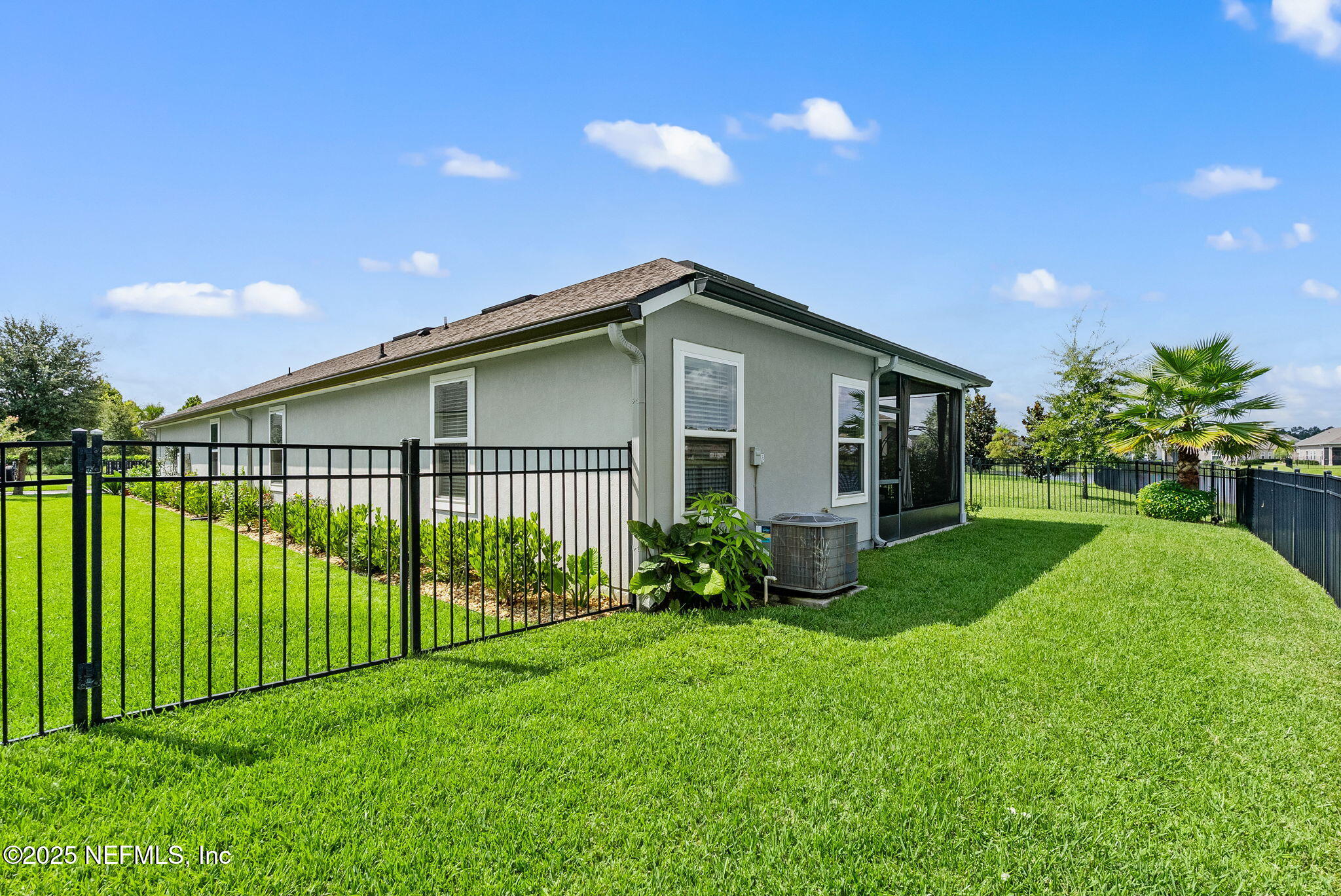 3961 Heatherbrook Place Middleburg, FL 32068 - Photo 24 of 28 a view of a house with a yard and plants