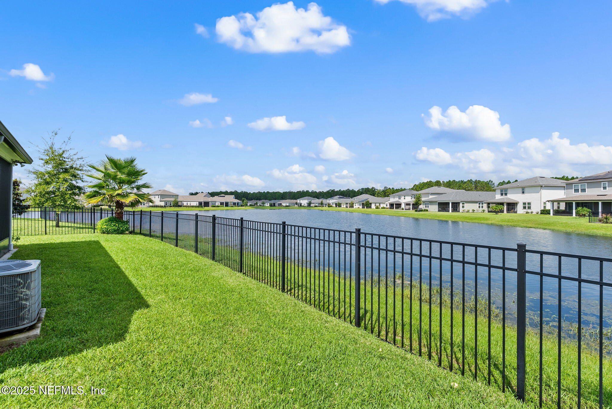 3961 Heatherbrook Place Middleburg, FL 32068 - Photo 25 of 28 a view of a pathway with a wrought fence