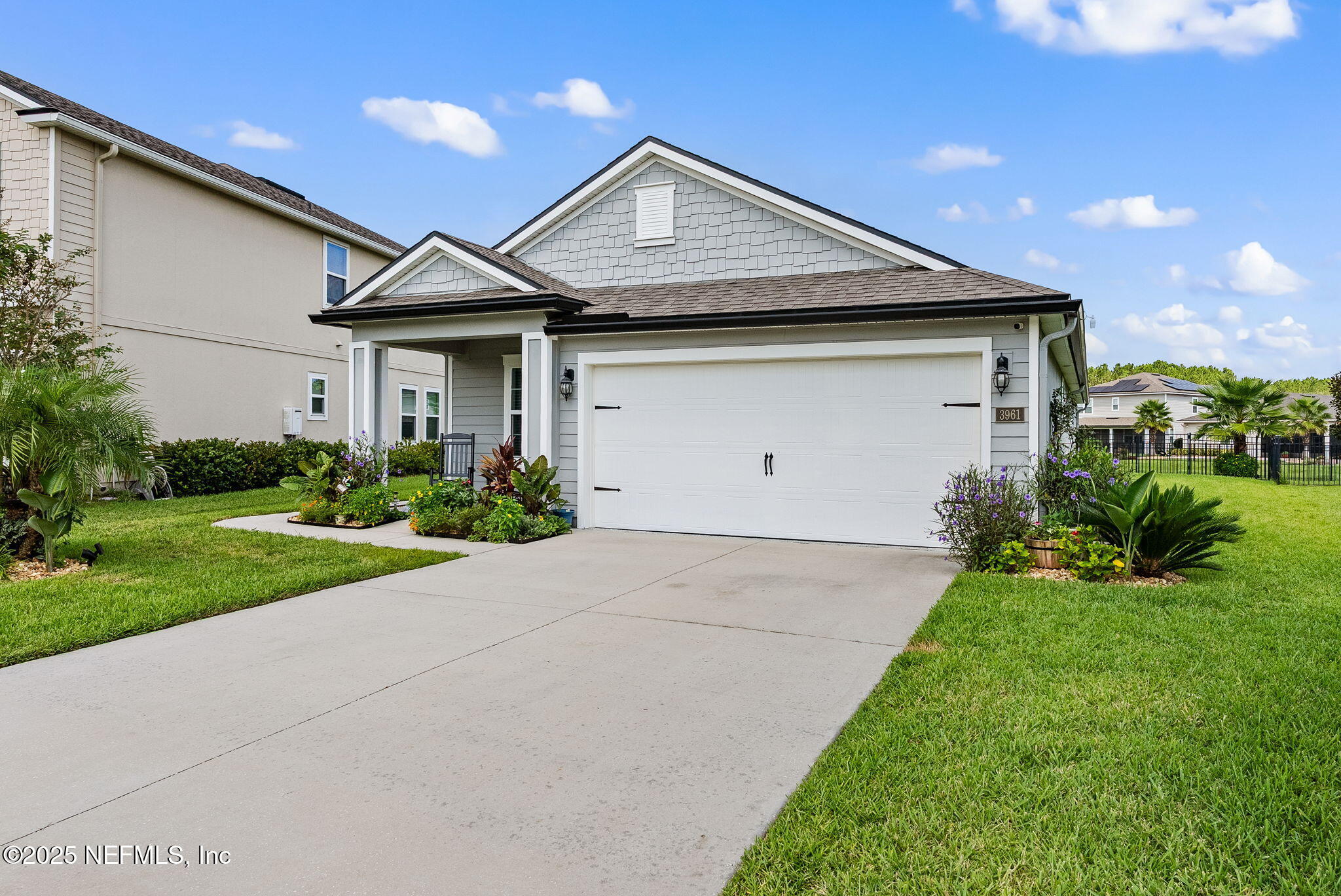3961 Heatherbrook Place Middleburg, FL 32068 - Photo 28 of 28 a front view of house with yard and green space
