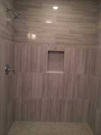 57 Upland Road Needham, MA 02492 - Photo 8 of 10 a bathroom with a shower