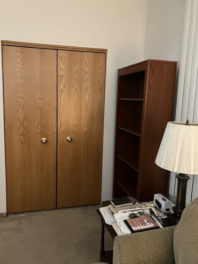 19246 104th Avenue Mokena, IL 60448 - Photo 36 of 38 a view of room with a table and a lamp