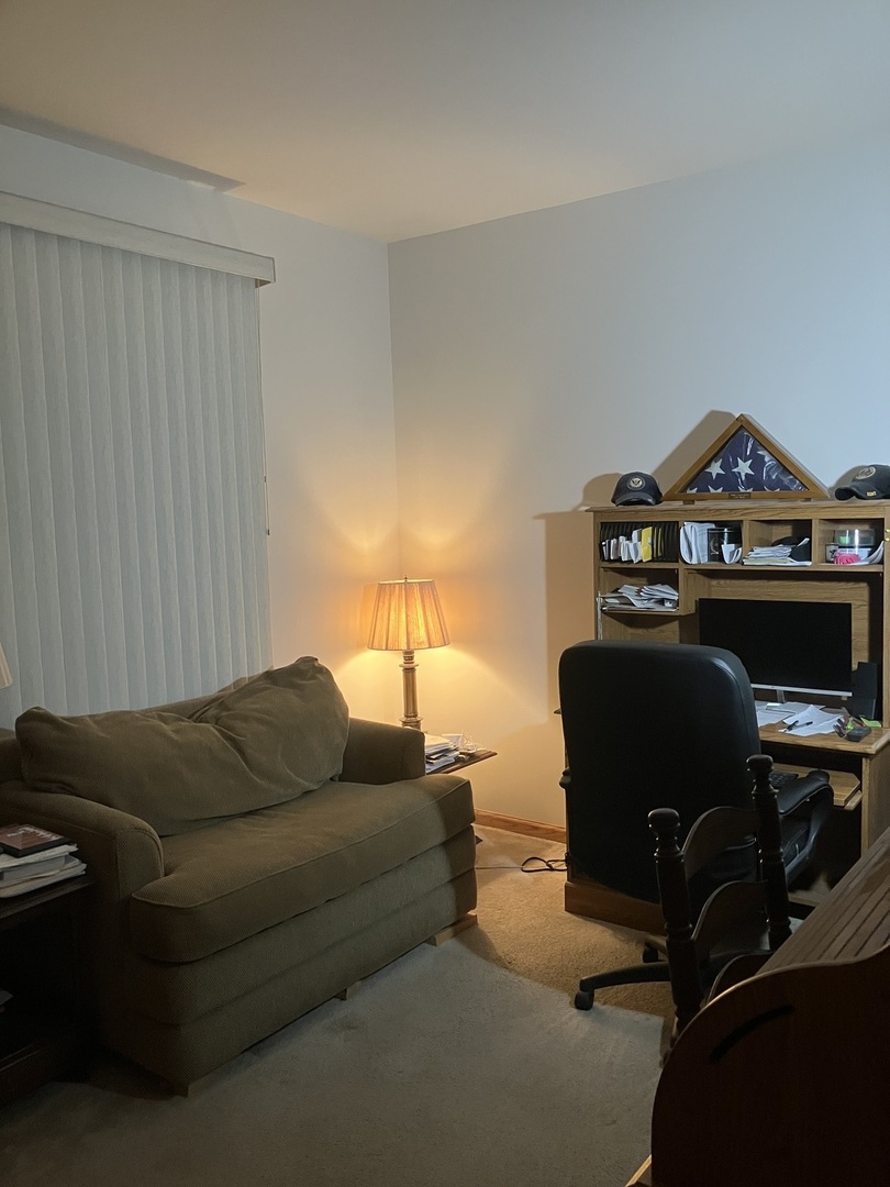 19246 104th Avenue Mokena, IL 60448 - Photo 38 of 38 a living room with furniture and a piano