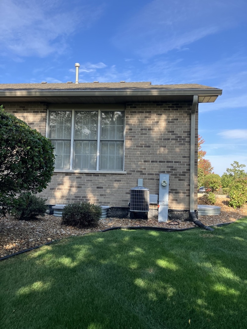 19246 104th Avenue Mokena, IL 60448 - Photo 6 of 38 a view of a house with a backyard