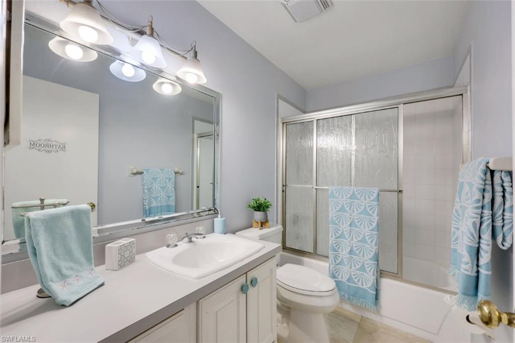 5685 Whitaker Road, Unit 202 Naples, FL 34112 - Photo 19 of 26 Coastal decor Guest Bathroom