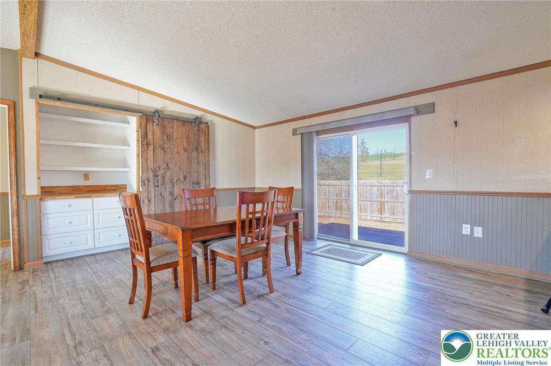 7221 Borman Road New Tripoli, PA 18066 - Photo 12 of 62 a dining room with furniture and wooden floor