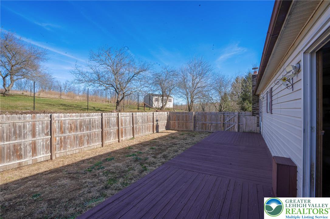 7221 Borman Road New Tripoli, PA 18066 - Photo 13 of 62 a view of a backyard with wooden fence
