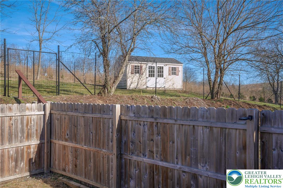7221 Borman Road New Tripoli, PA 18066 - Photo 14 of 62 a view of a wooden fence and a trees