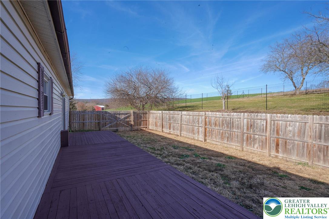 7221 Borman Road New Tripoli, PA 18066 - Photo 15 of 62 a view of a pathway with a wrought fence