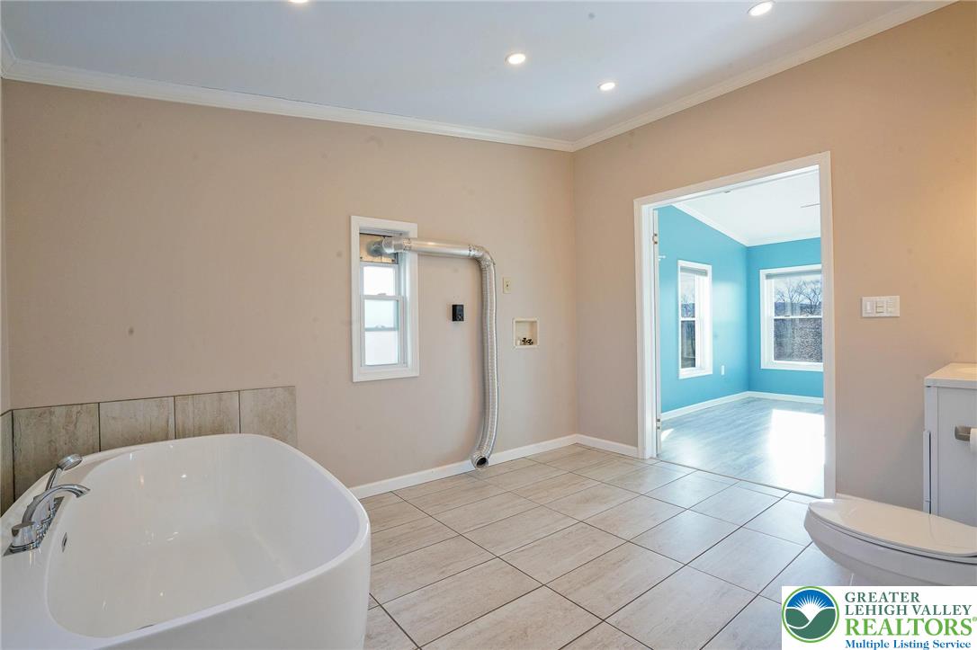 7221 Borman Road New Tripoli, PA 18066 - Photo 29 of 62 a bathroom with a bathtub and shower