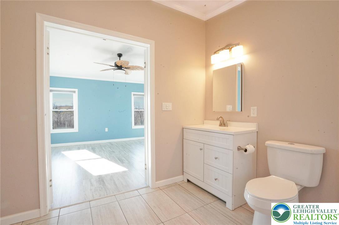 7221 Borman Road New Tripoli, PA 18066 - Photo 30 of 62 a bathroom with a toilet sink and mirror