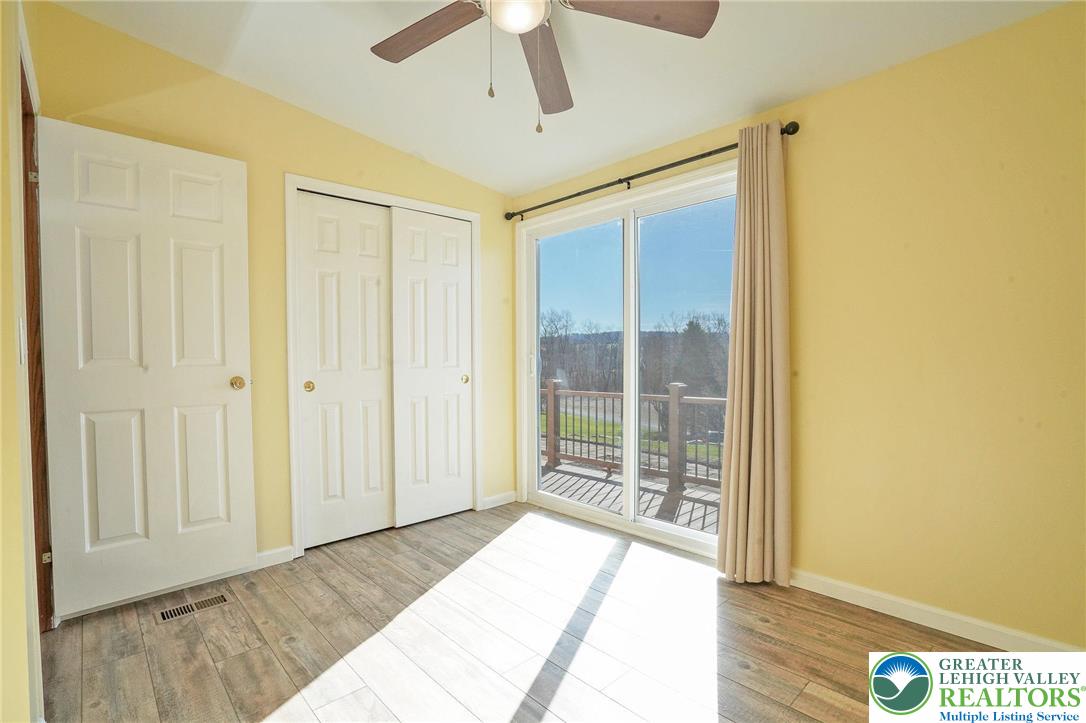 7221 Borman Road New Tripoli, PA 18066 - Photo 36 of 62 a view of a room with wooden floor and windows